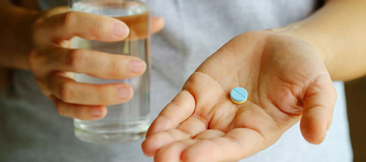 taking-tablets-with-water