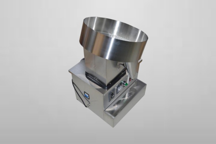 Vibratory capsule counting machine