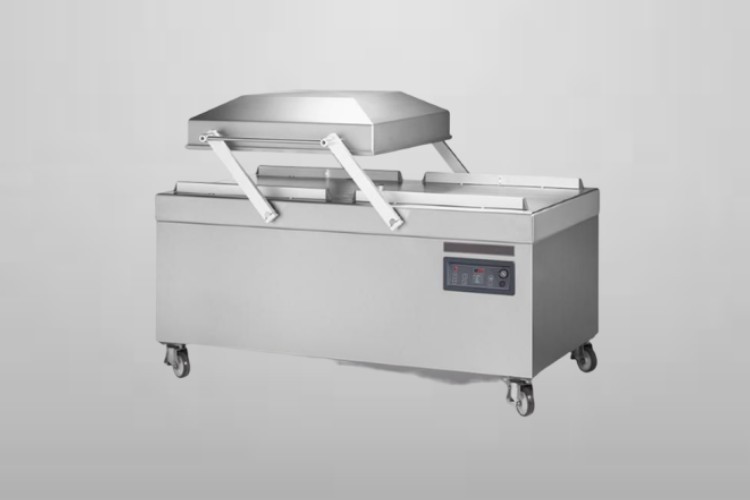 Double chamber vacuum packaging machine