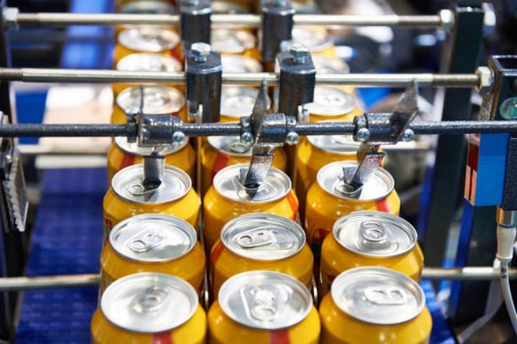 process of sealing Aluminium Cans