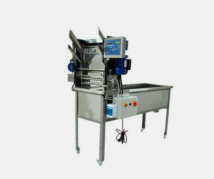Uncapping machine