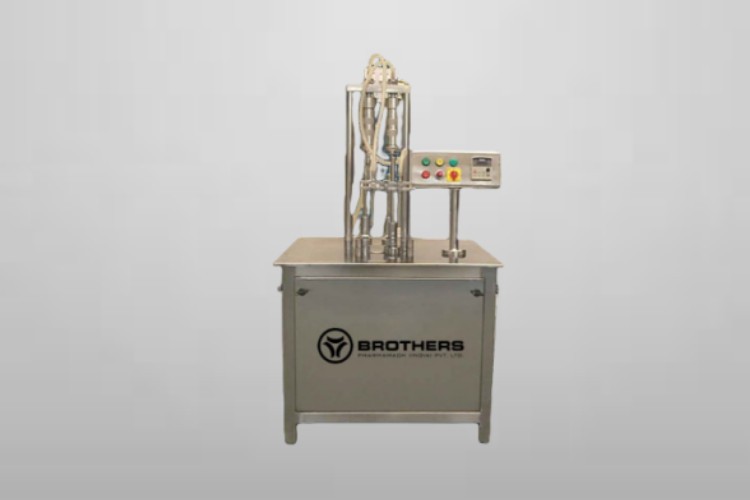Semi Automatic Twin Head Liquid Filling Machine